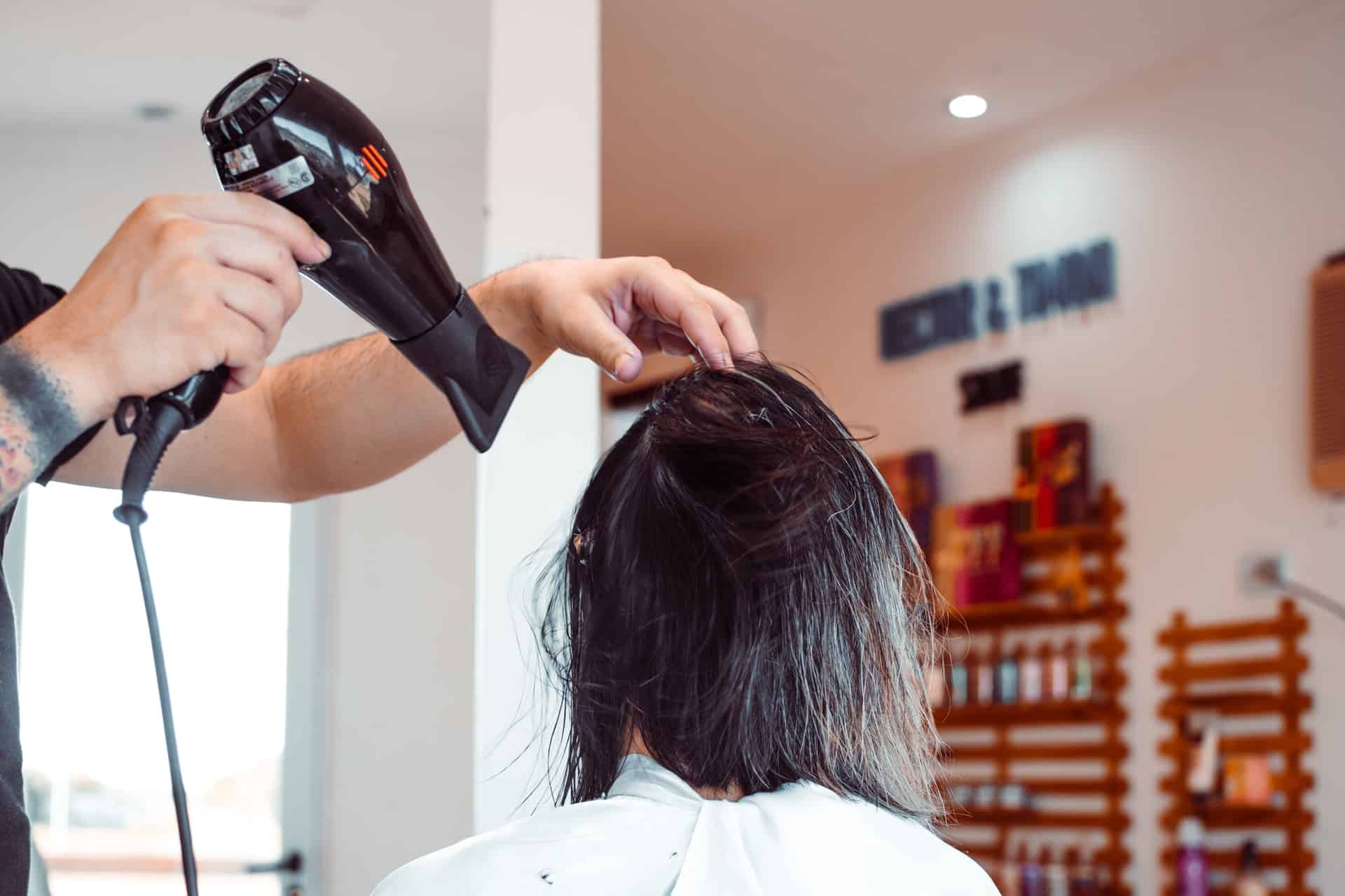 What should you consider when choosing a hair dryer?